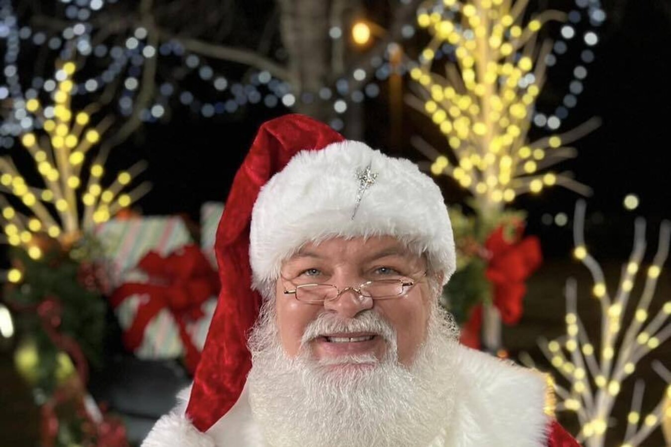 Hire Santa Claus Austin Real Bearded Santa Lights Hero Hire Santa Claus Austin real bearded Santa with holiday lights
