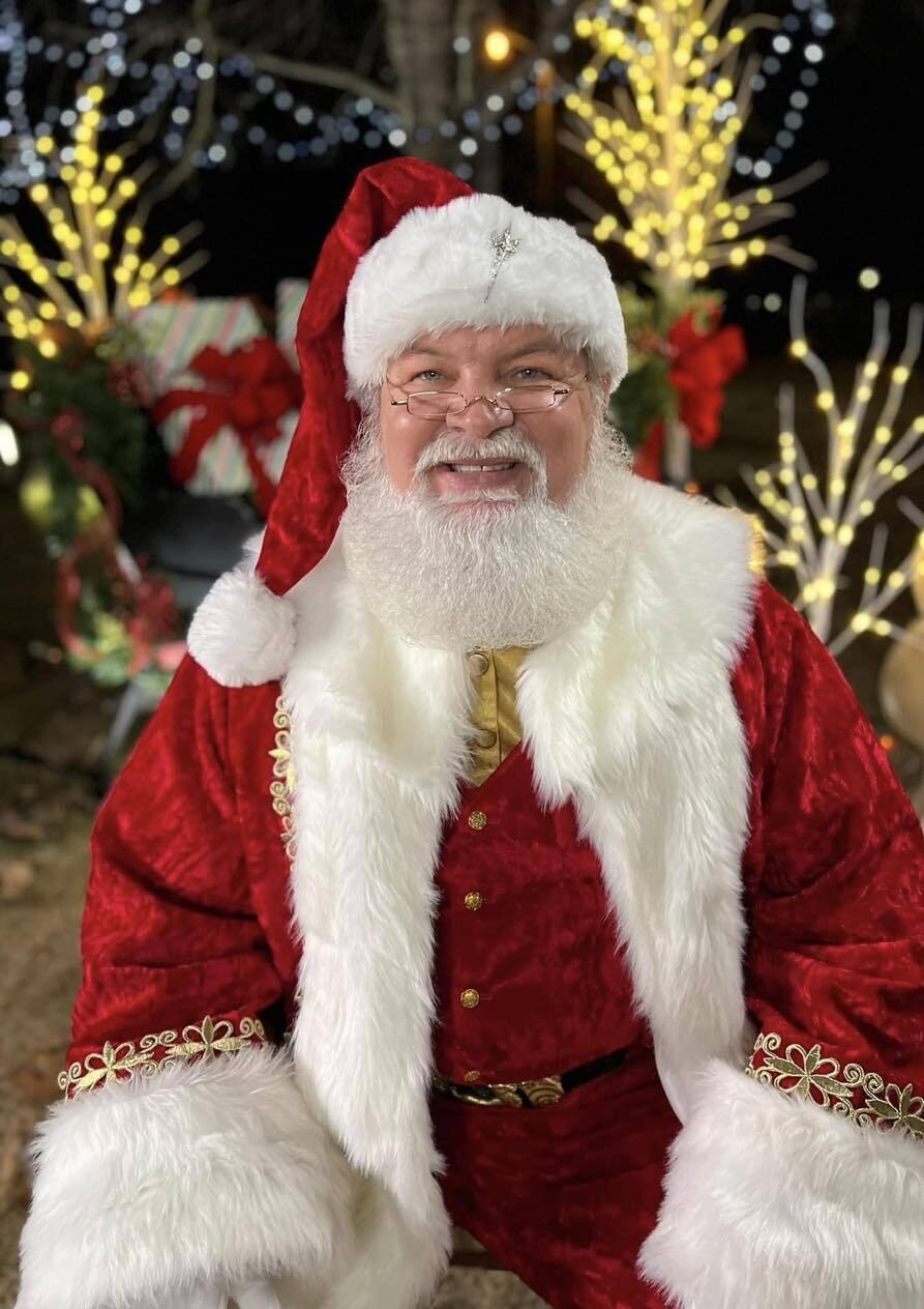 Professional Santa Claus Las Vegas holiday lights portrait