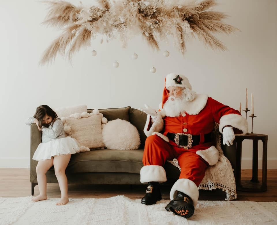 Professional Santa for hire near me for a home visit with child
